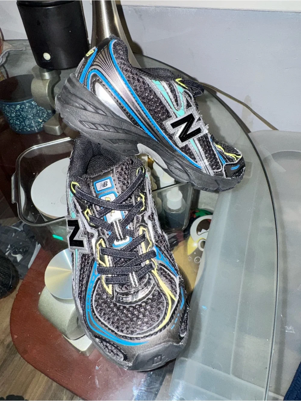 New Balance Kids Black with Blue & Silver Accent Sneakers